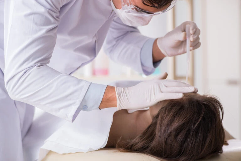Forensic Expert Examining Deceased Body 768x513