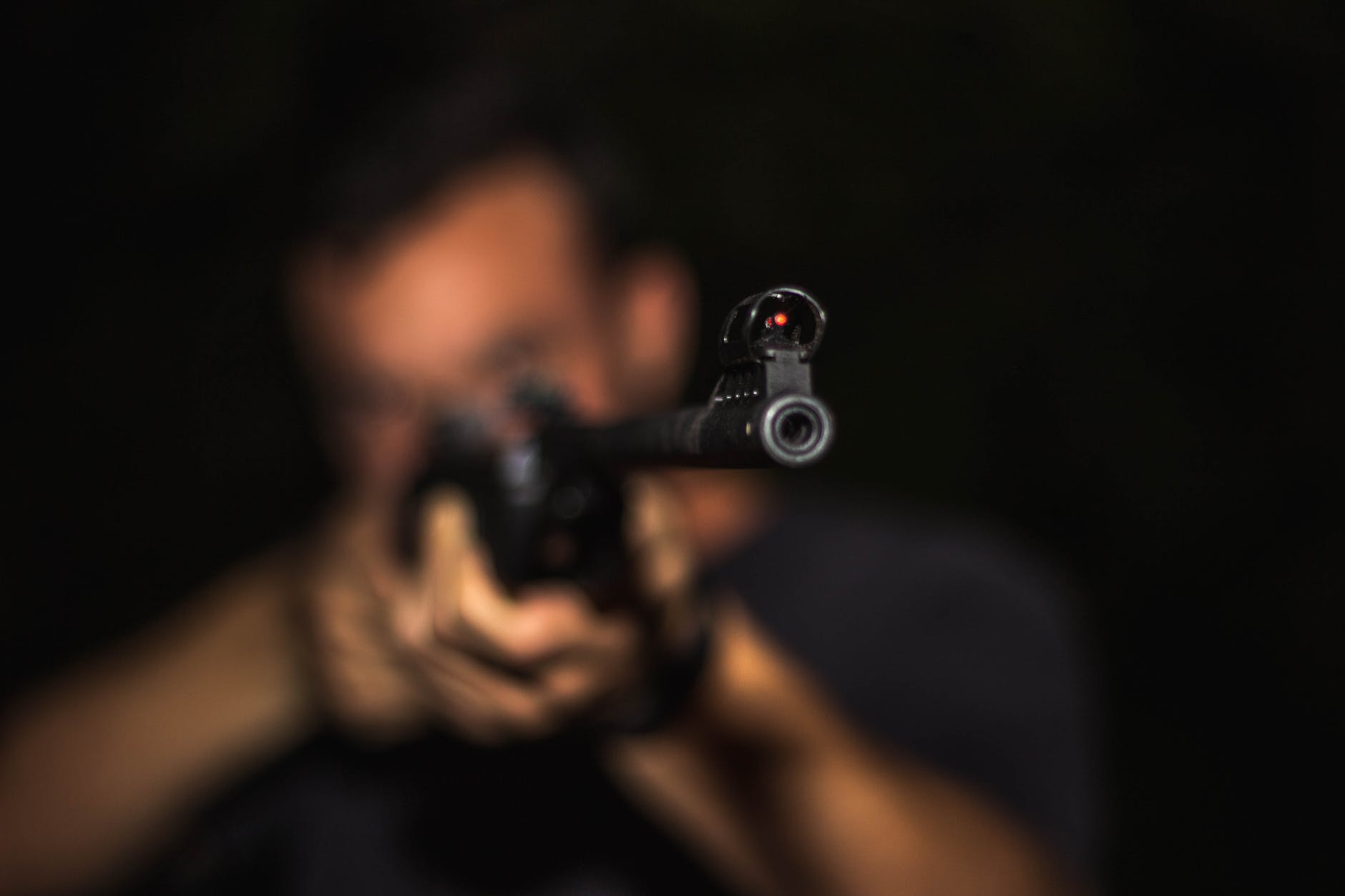 Pexels Photo 1592109 photo of man holding rifle Simplyforensic